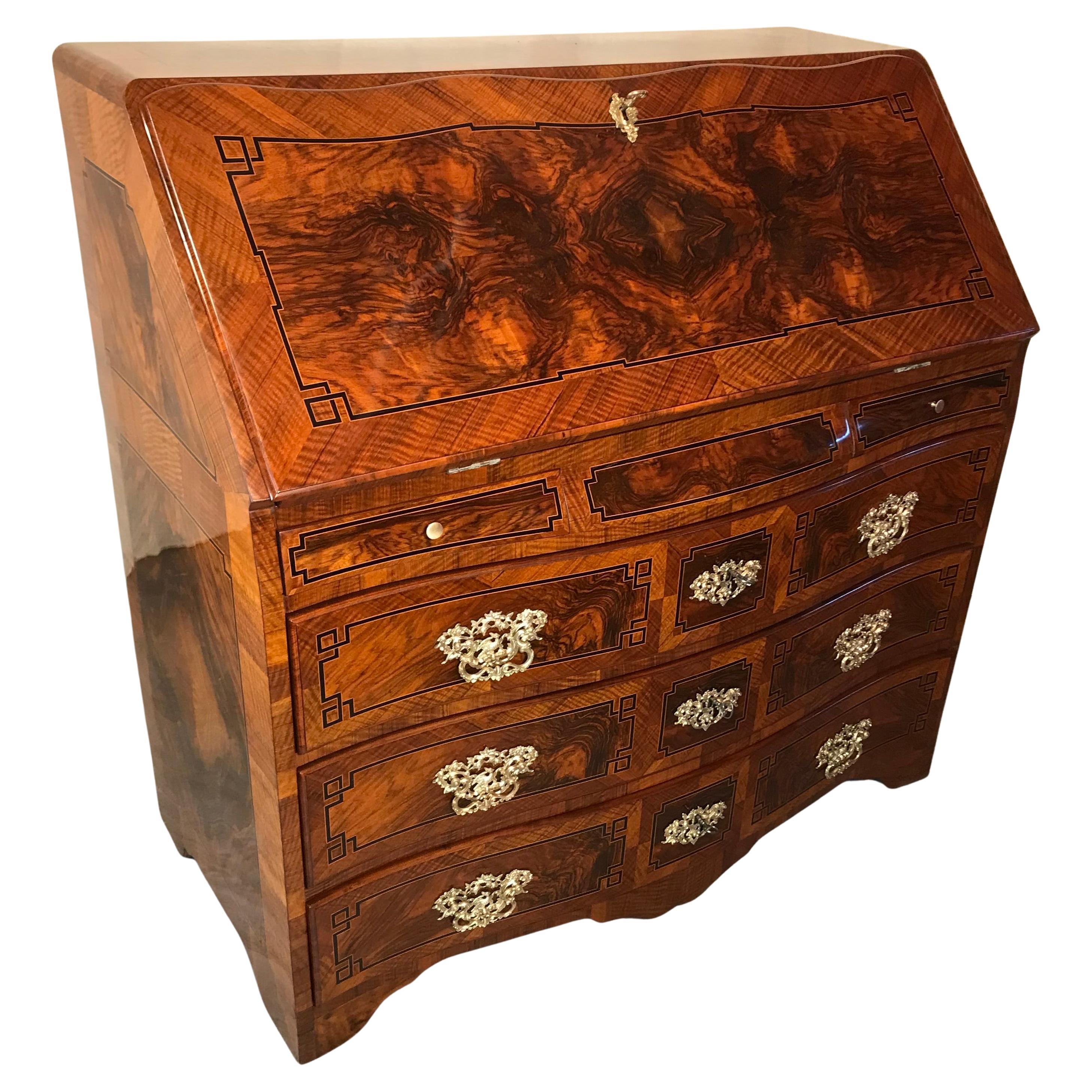 Exquisite Louis XVI Secretary Desk  South Germany, 1770-80

Discover a stunning Louis XVI secretary desk from South Germany (circa 1770-1780), a true masterpiece of late Baroque and early Neoclassical furniture design. This antique bureau features