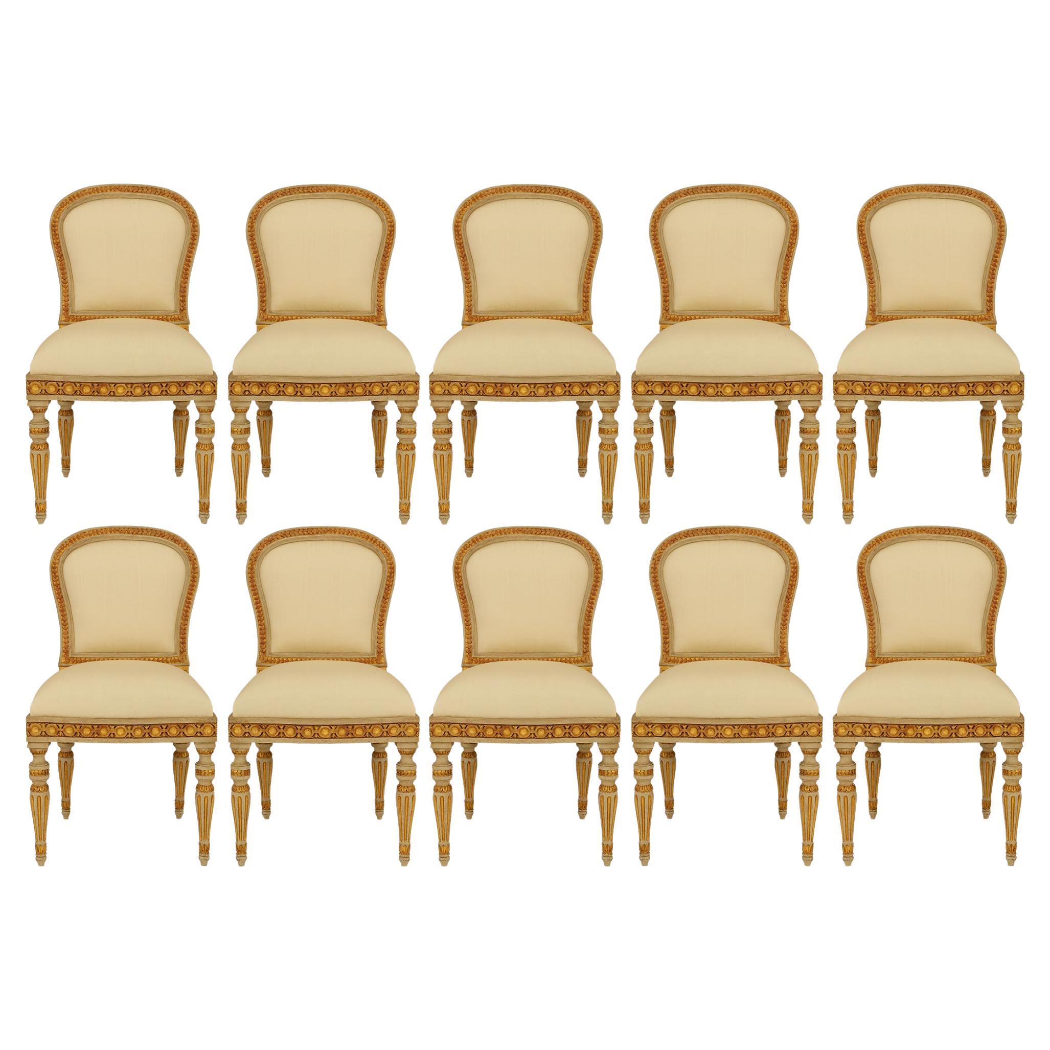 Louis XVI st. patinated Wood and Giltwood ‘A Chassis’ dining chairs For Sale