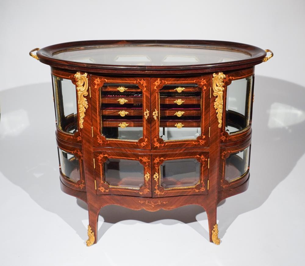 French Louis XVI Style Crested Gilt-Silver Assembled Flat Table Service in a Louis XV Style Ormolu Mounted Kingwood Fitted Vitrine cabinet. Enjoy one the greatest combination of top of the line Silver ware marks Cardeilhac / Christofle, Tetard