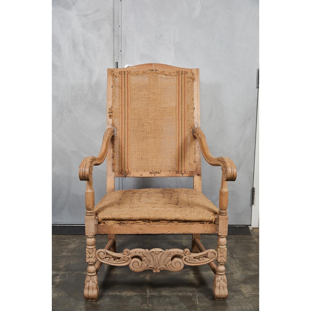 This Louis XVI style armchair has a bleached wood finish. The frame is heavily carved with patterned, flora and fauna decorative elements. The chair has been stripped down to the burlap and are ready for re-upholstery.


 
 