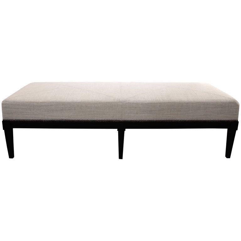 This stylish and chic bench was acquired from a model home in Palm Beach and will make the perfect perch at the end of your bed or perhaps in an entry. The frame is a classic Louis XVI style finished in black, which works beautifully with the