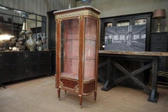 Louis XVI Style Bookcase in Curved Glass Marble Bronze and Marble Top circa 1880