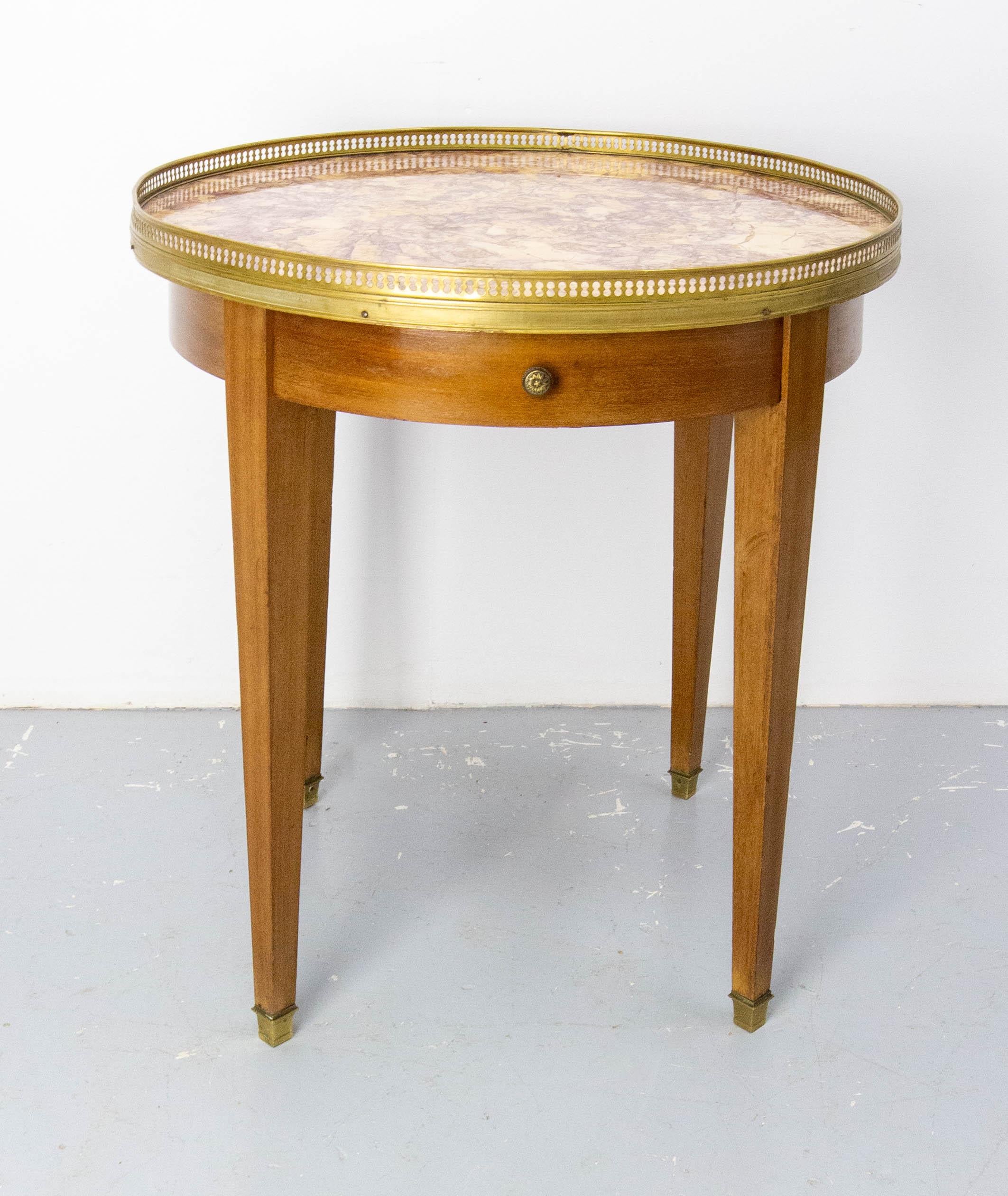 Pair of French Louis XVI style bouillotte table with purple and yellow marble-top. 
Brass gallery and brass feet 
One drawer.
The name “bouillotte” comes from a French gambling card game that became popular during the Revolution in the 18th century.