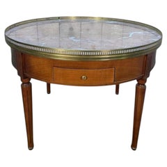 Louis XVI style bouillotte low table with pink marble top