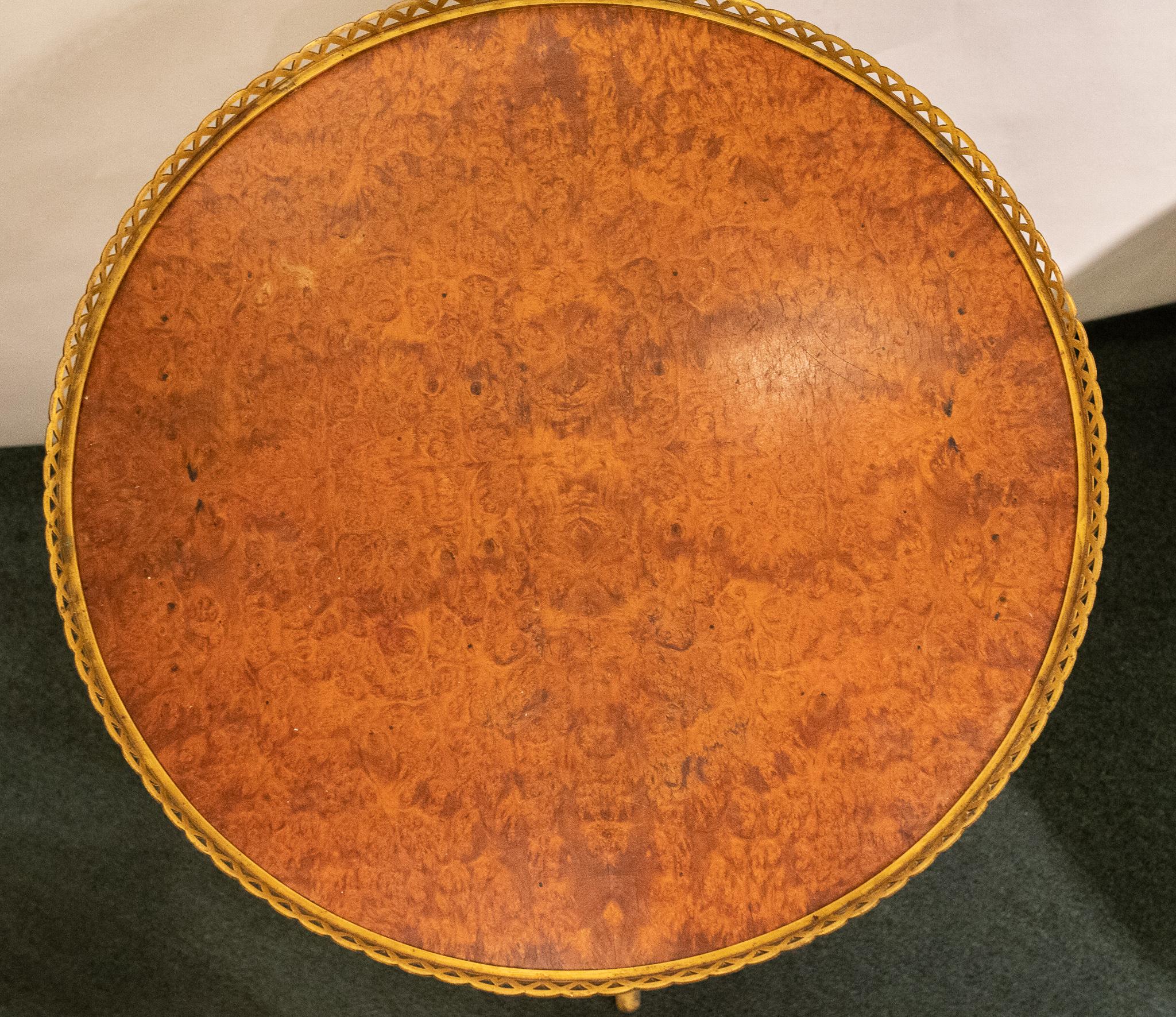 A very fine quality 19th century French Louis XVI style bamboo motif bronze mounted. Burl wood two-tier round side table.
After a model by Adam Weisweiler.