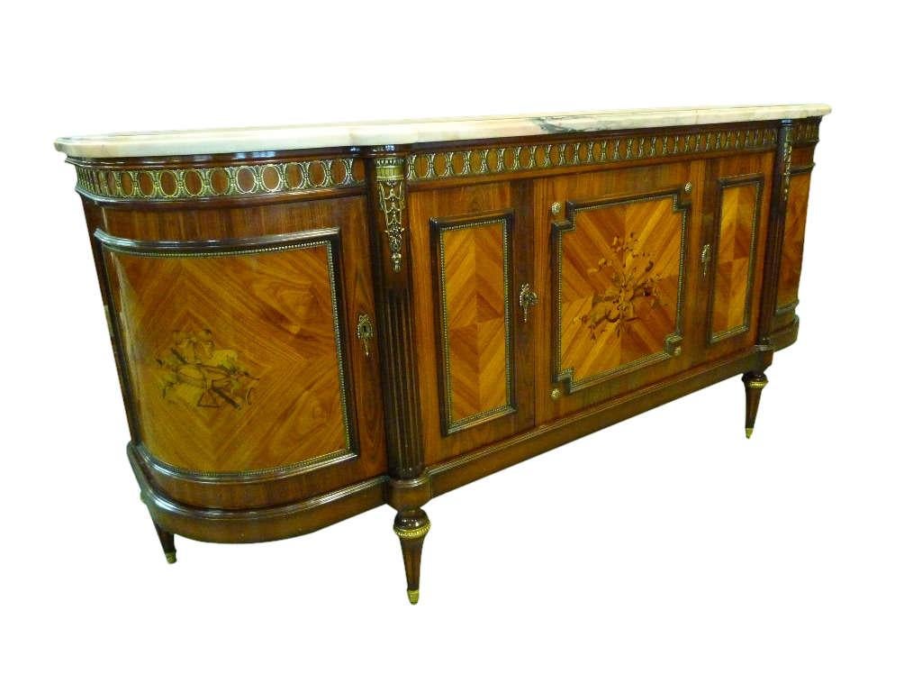 Louis XVI style rosewood and inlaid marquetry flowers by JP Ehalt
(signed on the matching dining table we are selling separately)
Variegated marble top
Bronze ormolu
With 5 doors
JP Ehalt is a well renowned and reputable manufacturer in