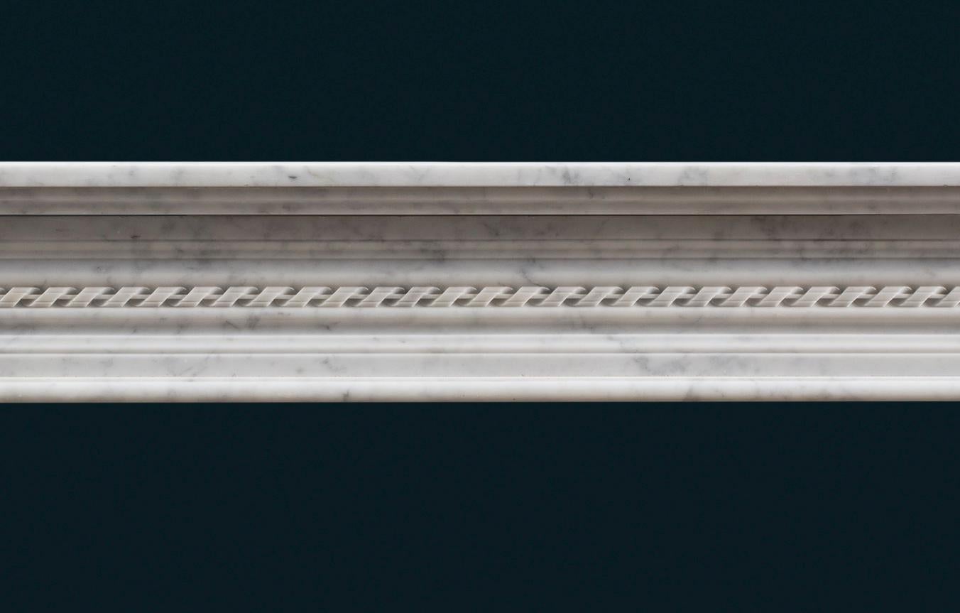 Hand-Carved Louis XVI Style Carrara Marble Fireplace Surround For Sale