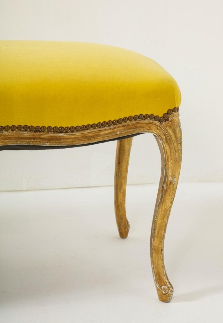 French Louis XVI Style Carved and Gilded Bench with Yellow Velvet Top, c. 1930