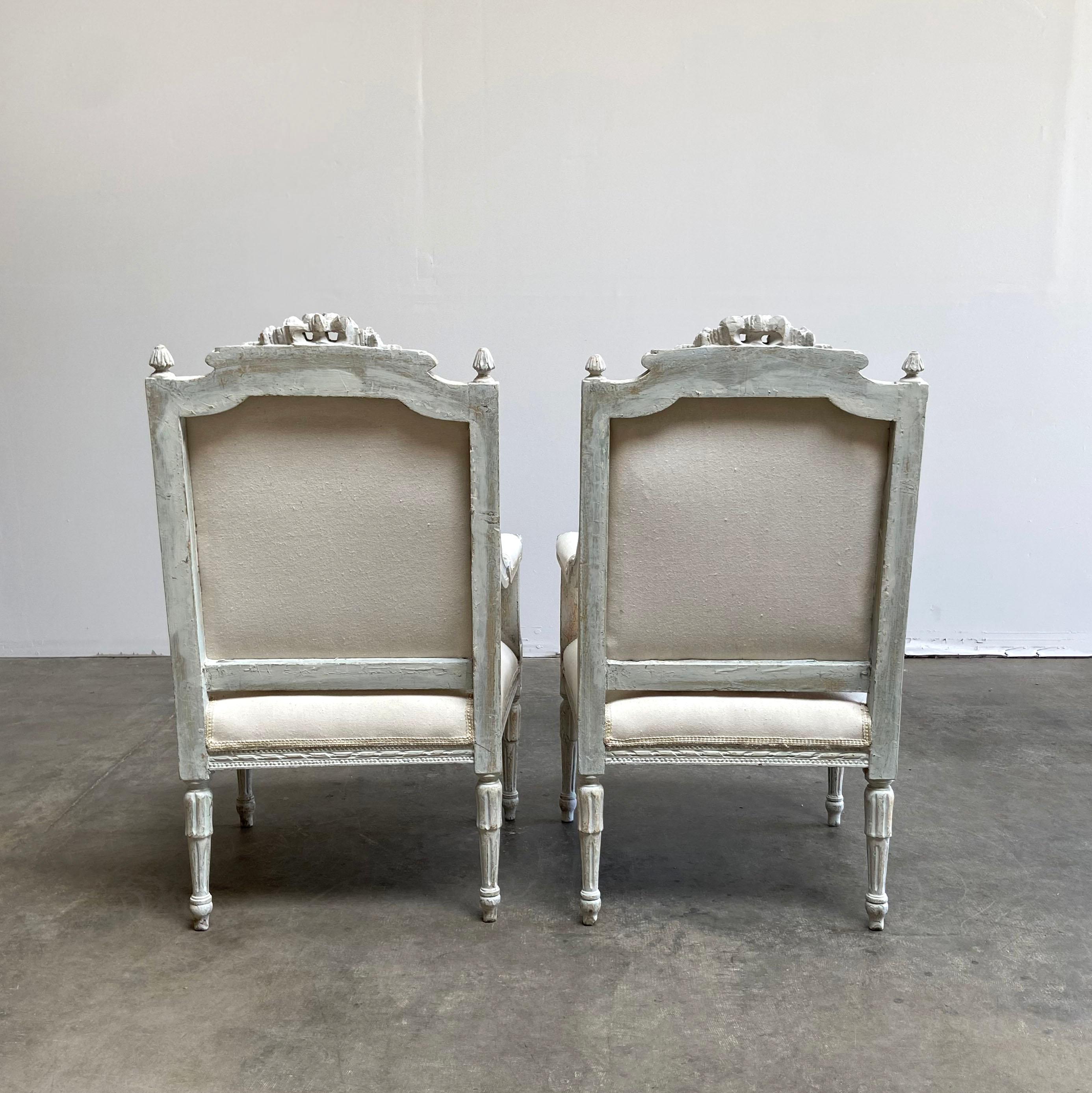 20th Century Louis XVI Style Carved and Painted Open Arm Chairs