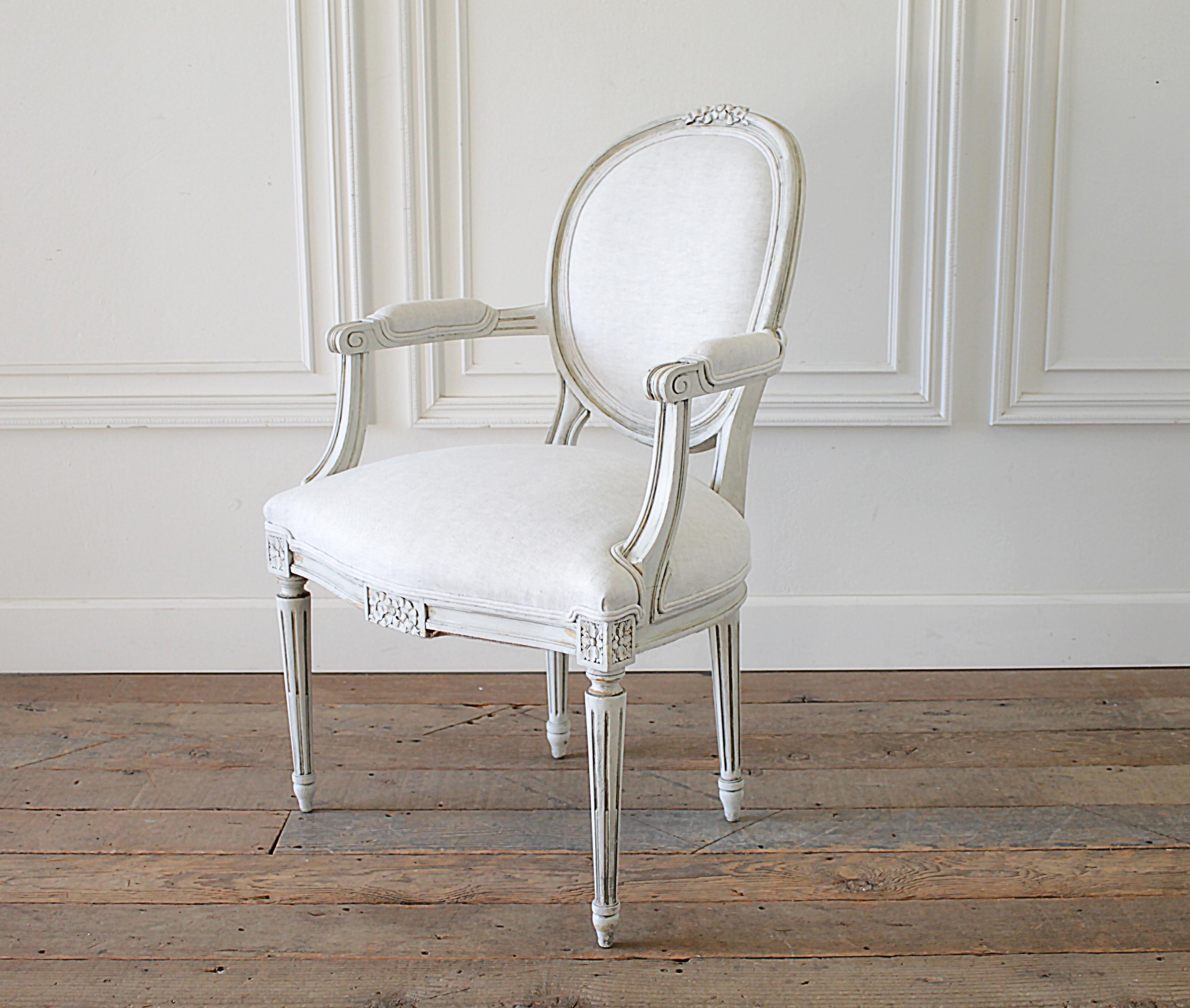 Louis XVI style carved and painted ribbon armchair
Painted in our oyster white finish, with subtle distressed edges and finished with an antique glazed patina.
Brand new upholstery in 100% pure Belgian linen, finished with a double welt