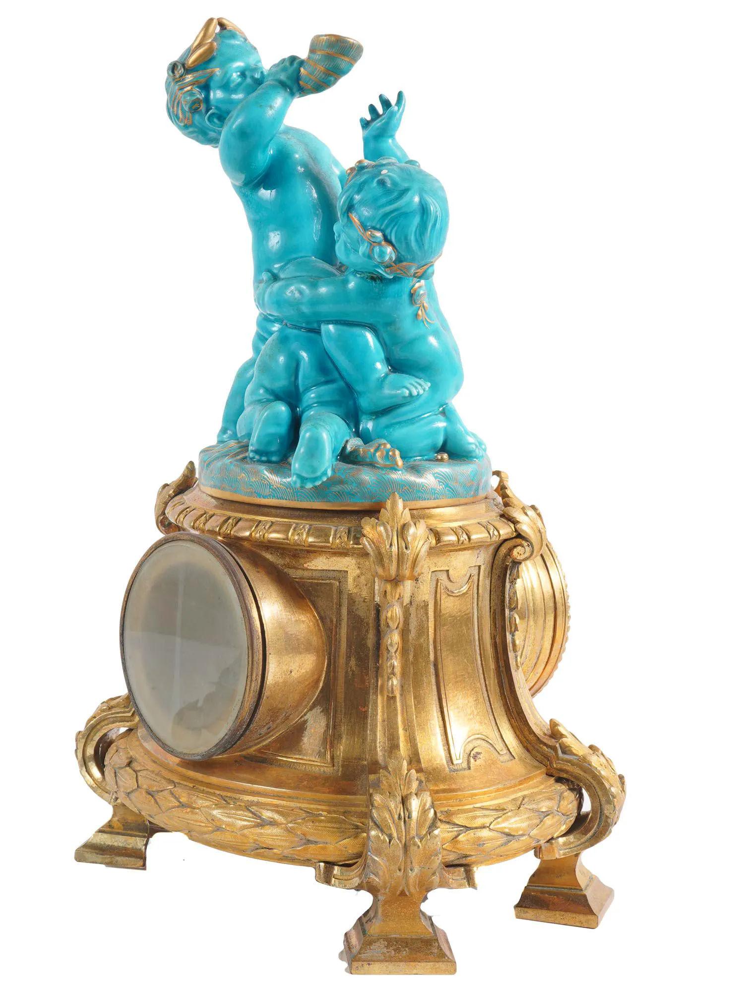 Louis XVI Style Celest Blue Sevres Porcelain and Bronze Putti Clock Set In Good Condition In New York, NY