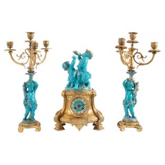 Louis XVI Style Celest Blue Sevres Porcelain and Bronze Putti Clock Set