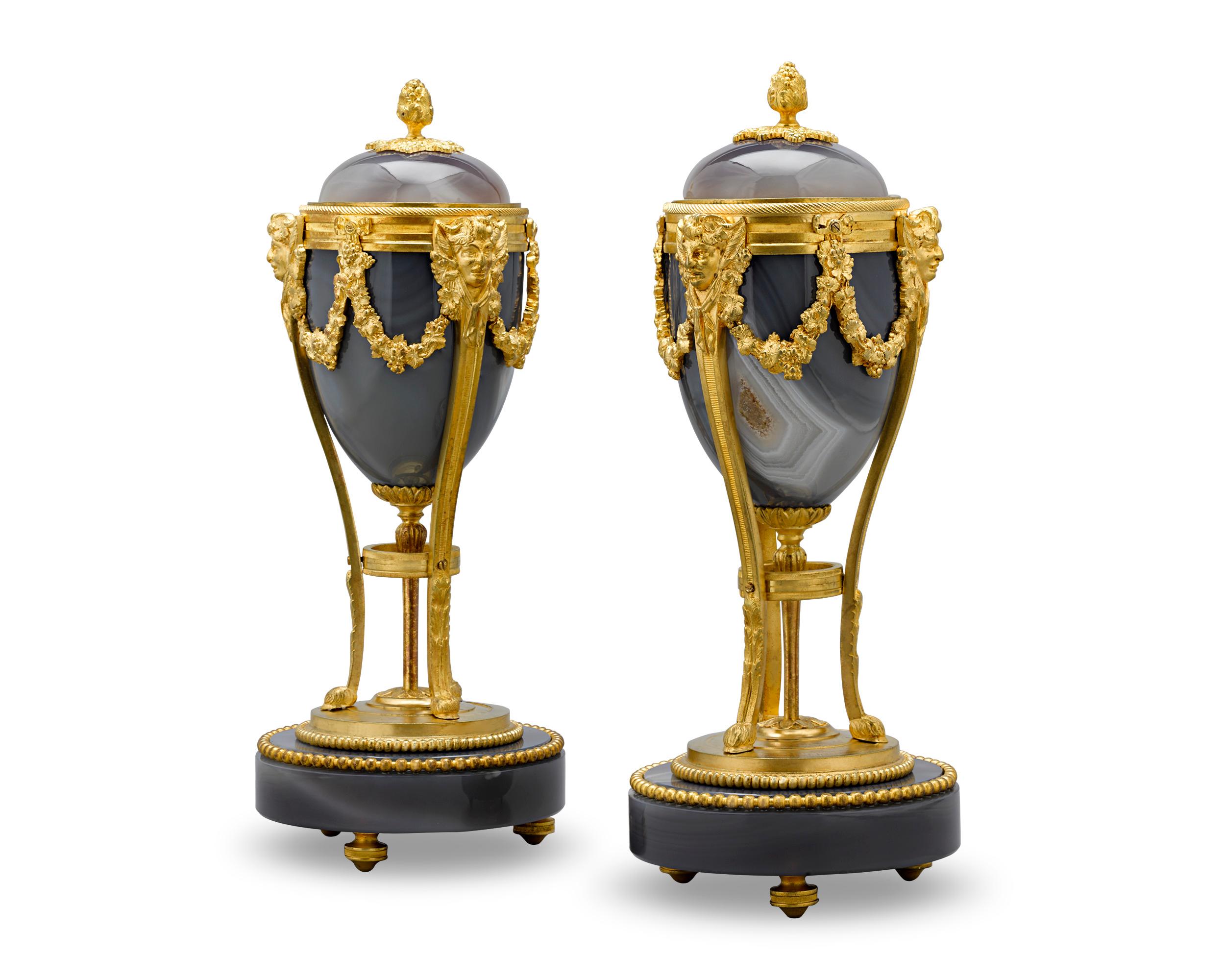 The bodies of this pair of Louis XVI-style cassolettes are formed from stunning examples of chalcedony. Their graceful design showcases the qualities for which this mineral is so loved, from its radiating crystalline structure to its rich shades of