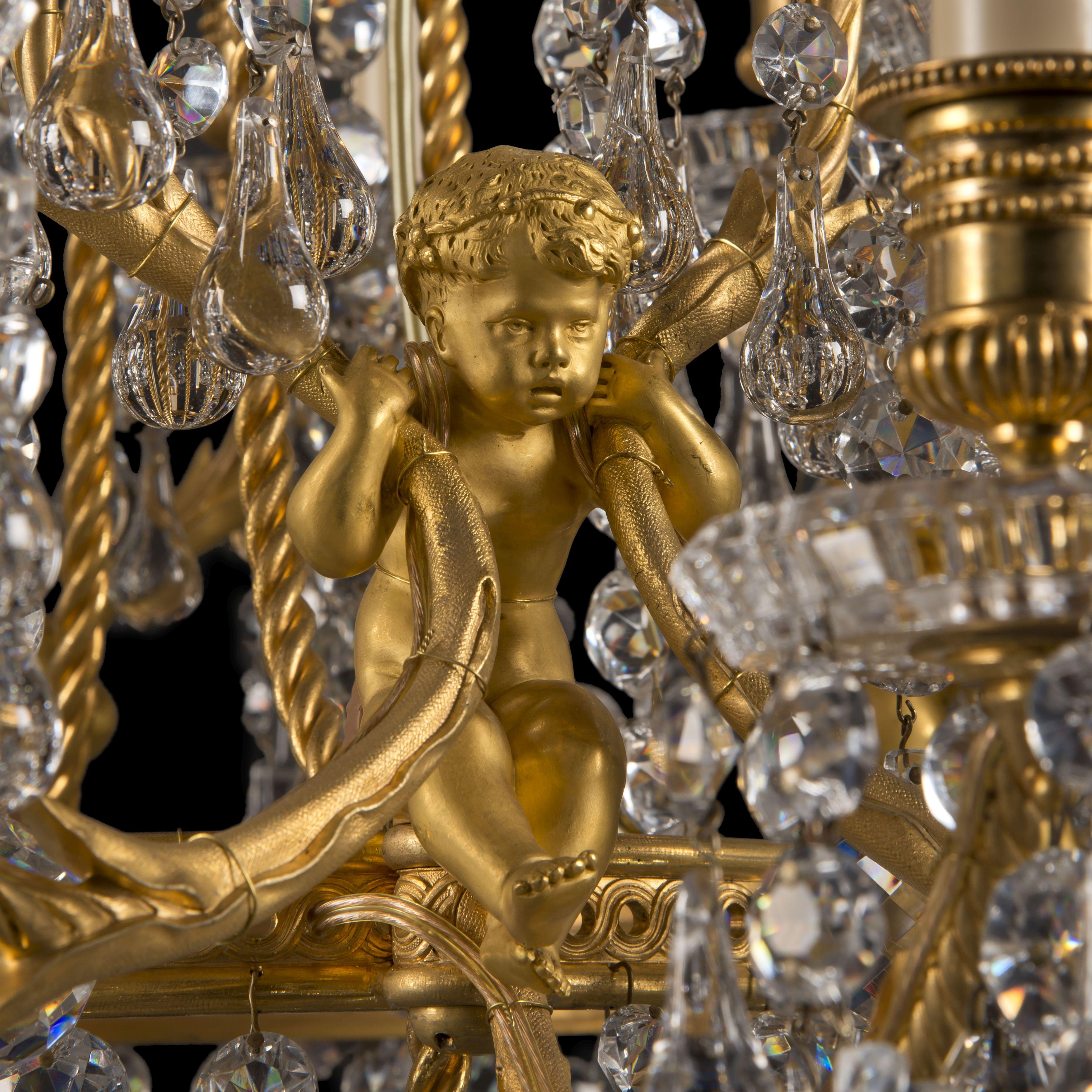 A fine Louis XVI style gilt-bronze and moulded-glass twenty-light chandelier by La Compagnie des Cristalleries de Baccarat.

Stamped to the central stem 'Baccarat'. 
Moulded 'Baccarat' signature to the drip trays. 

The design for this