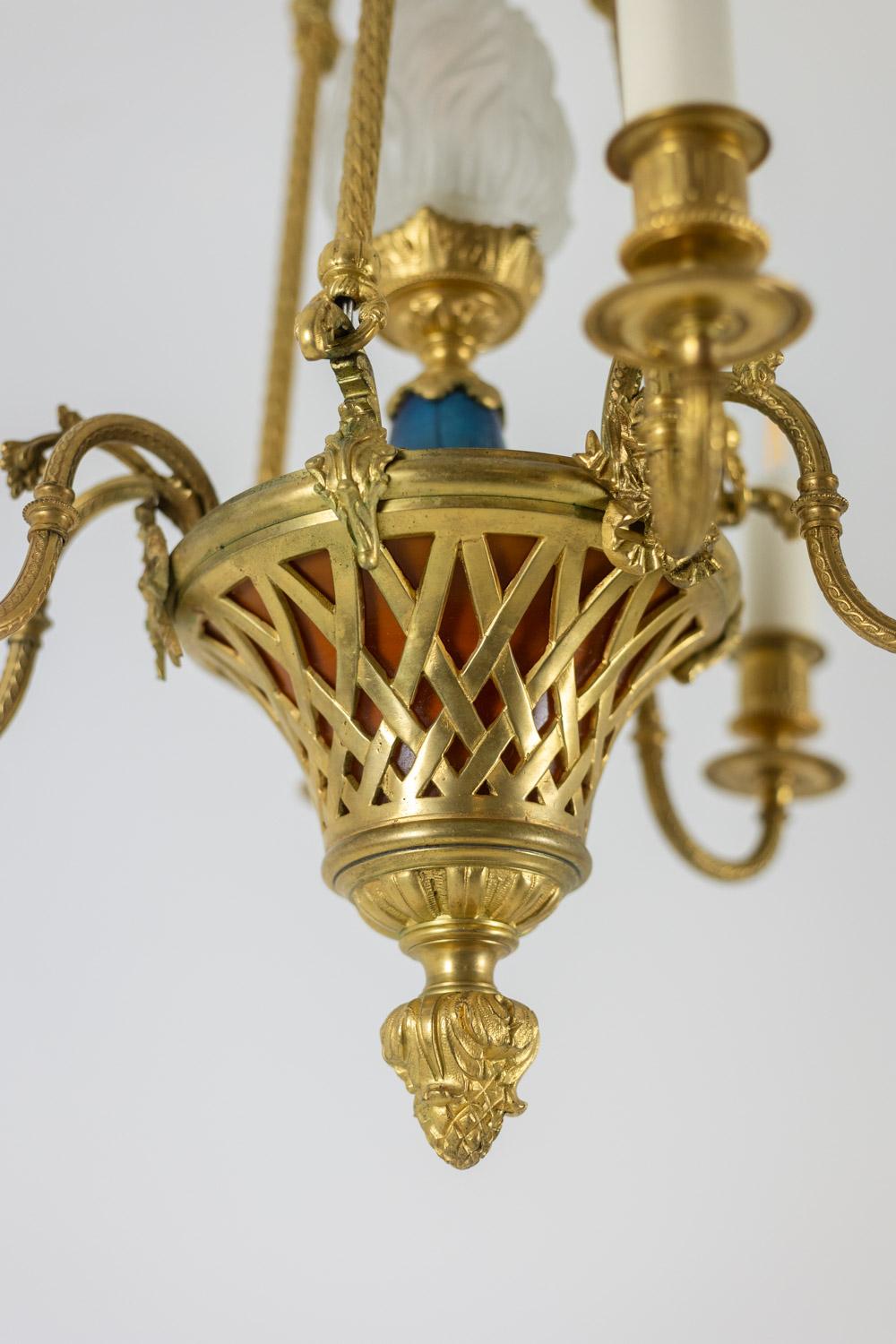 Bronze Louis XVI style chandelier in gilded bronze. Circa 1900. For Sale