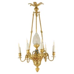 Antique Louis XVI style chandelier in gilded bronze. Circa 1900.