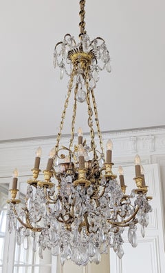 Louis XVI Style Chandelier in Gilt Bronze and Crystals Decorated with Rams Heads