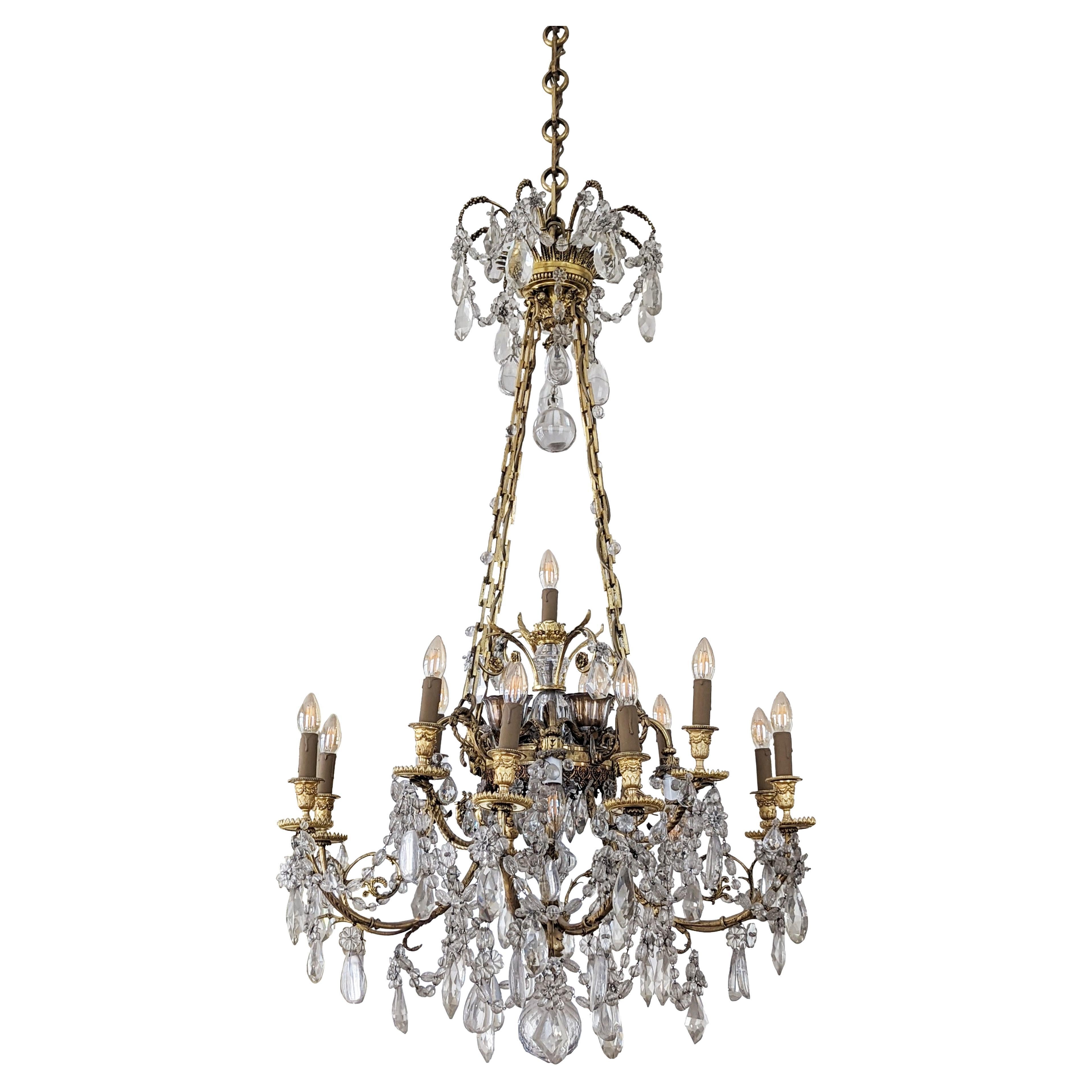 Louis XVI Style Chandelier in Gilt Bronze and Crystals Decorated with Rams Heads