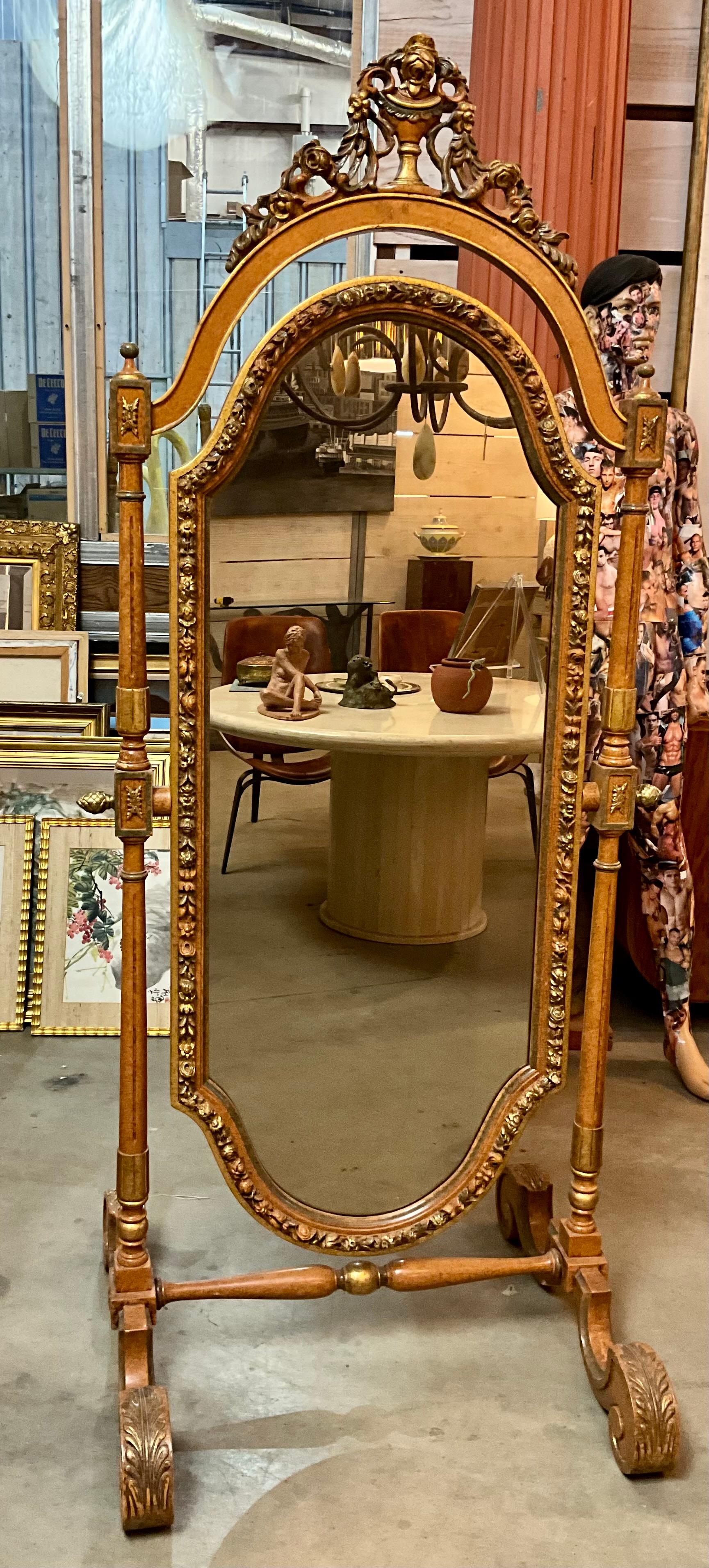 Louis XVI Style Cheval Mirror

This exquisite adjustable floor mirror features a stunning Louis XVI style design, complete with intricate acanthus leaf motifs and a beautifully ornate faux finish. The full-length cheval mirror is framed elegantly,