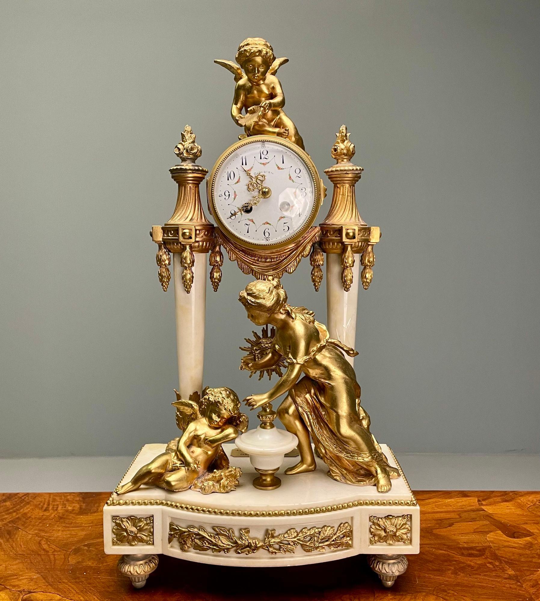 Louis XVI Style, Clock Garniture, Gilt Bronze, Marble, France, 1920s

A finely cast bronze and marble clock set depicting Leto and her Children Apollo and Diana. The set having a Made in France Foundry Stamp and a Plaque marked Auguste Moreau dated