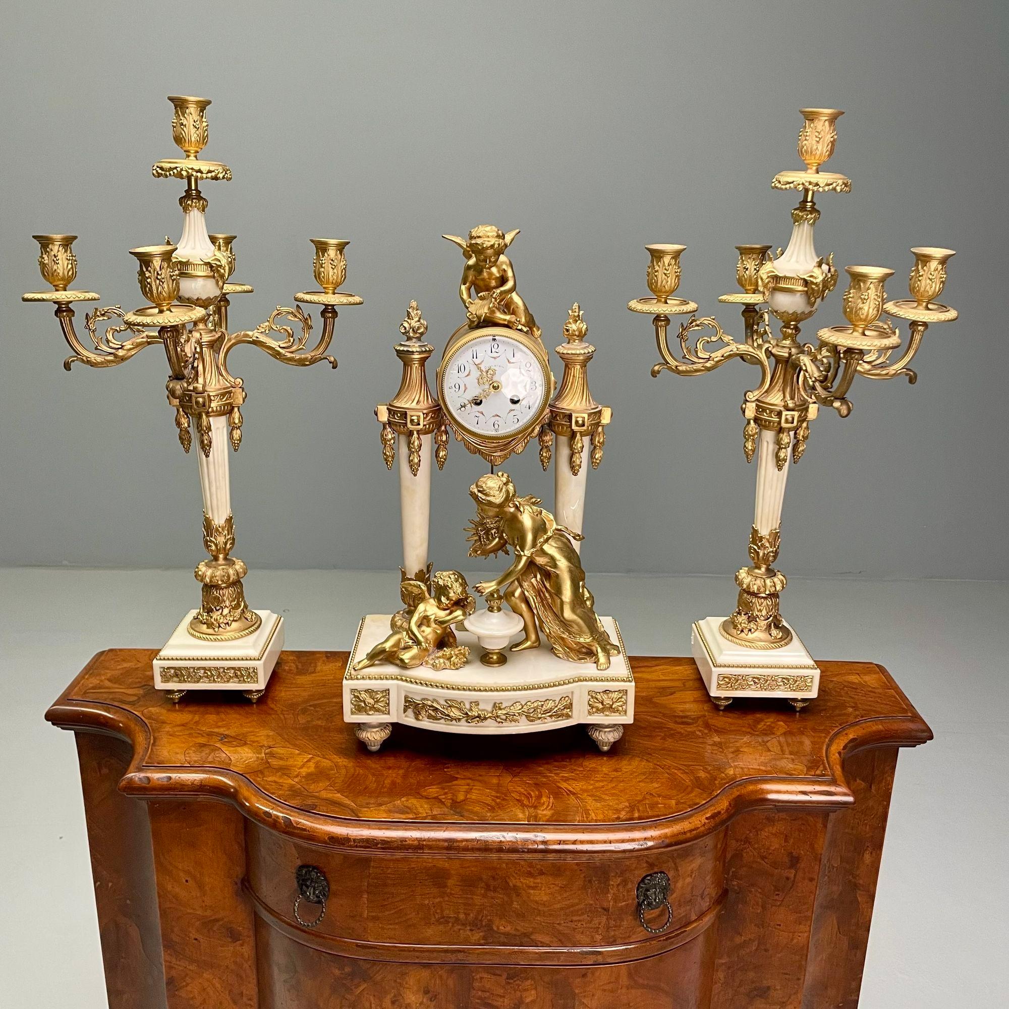 French Louis XVI Style, Clock Garniture, Gilt Bronze, Marble, France, 1920s For Sale