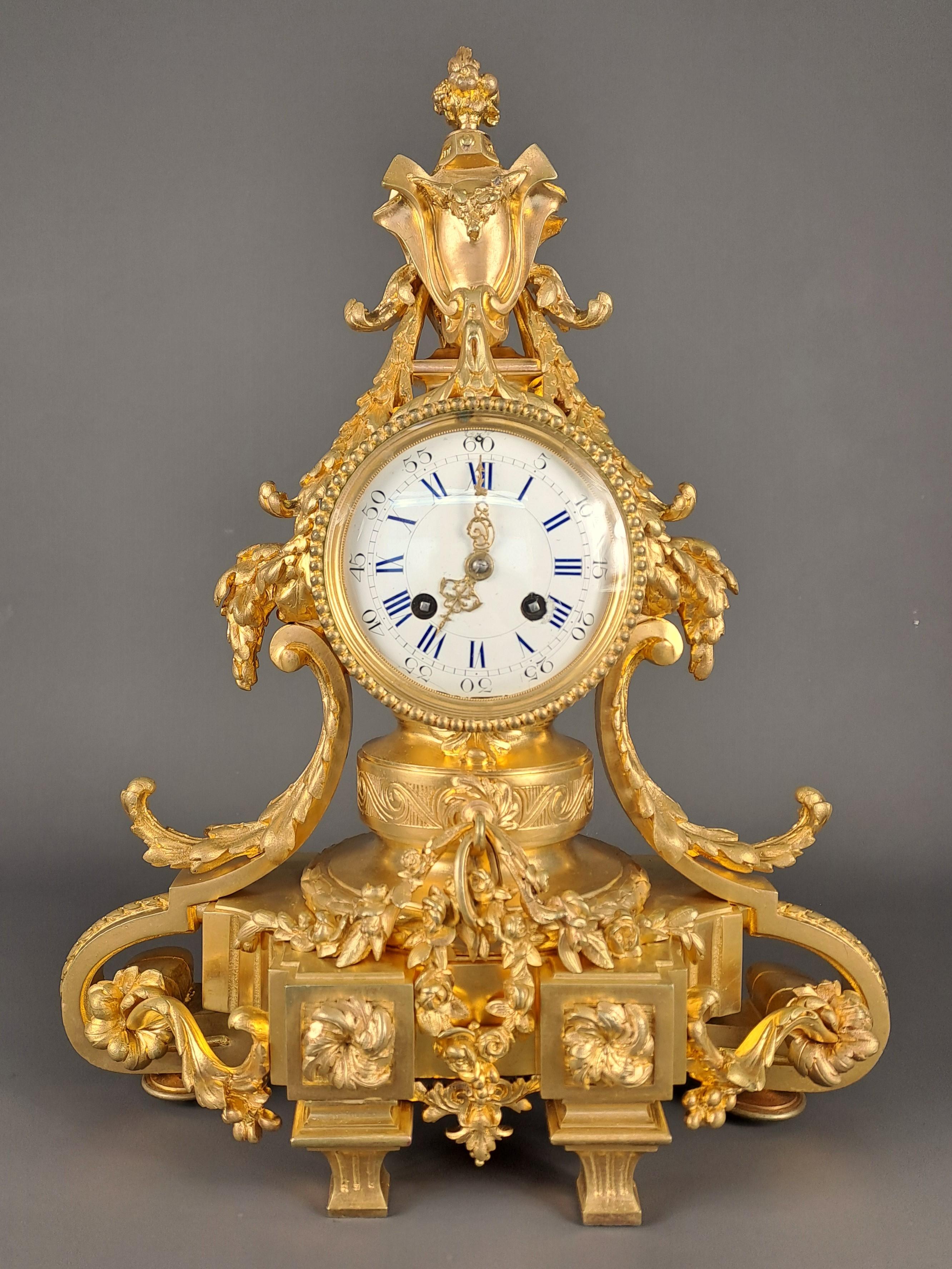 French Louis XVI Style Clock In Gilt Bronze