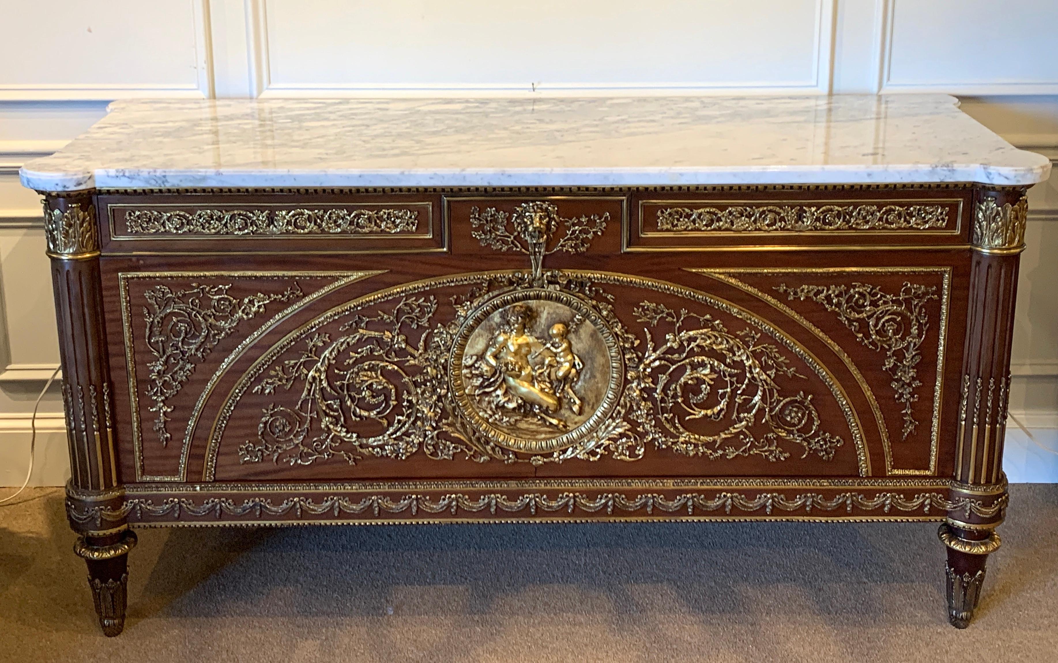 A 20th century Louis XVI style Guillaume Benneman from a model by Joseph Stöckel. The original supplied to Marie-Antoinette for the Salon des Jeux at Fontainebleau in 1786. This is an exceptional cabinet made example of the famed commode. With fine