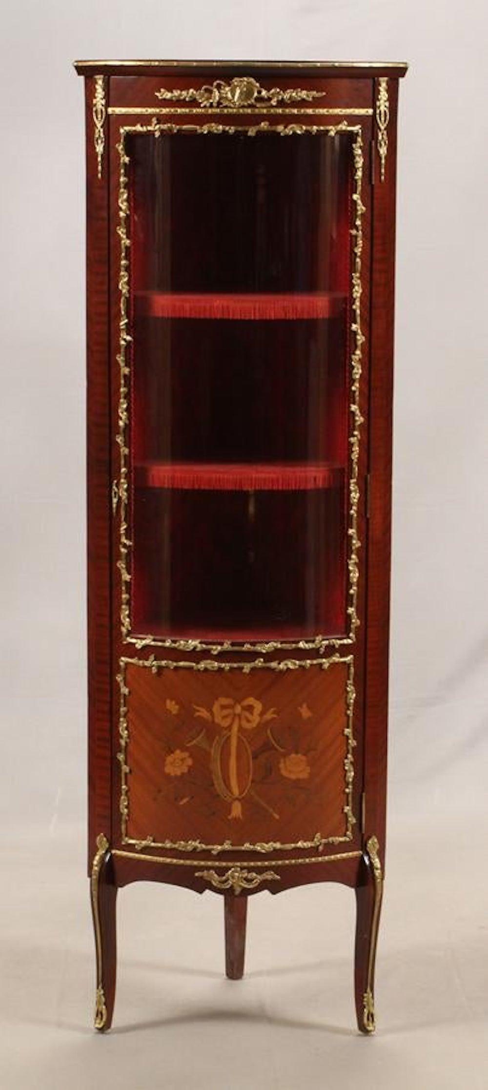 Louis XVI style corner curio cabinet with bronze ormolu glass-paneled doors. Measures: H 62