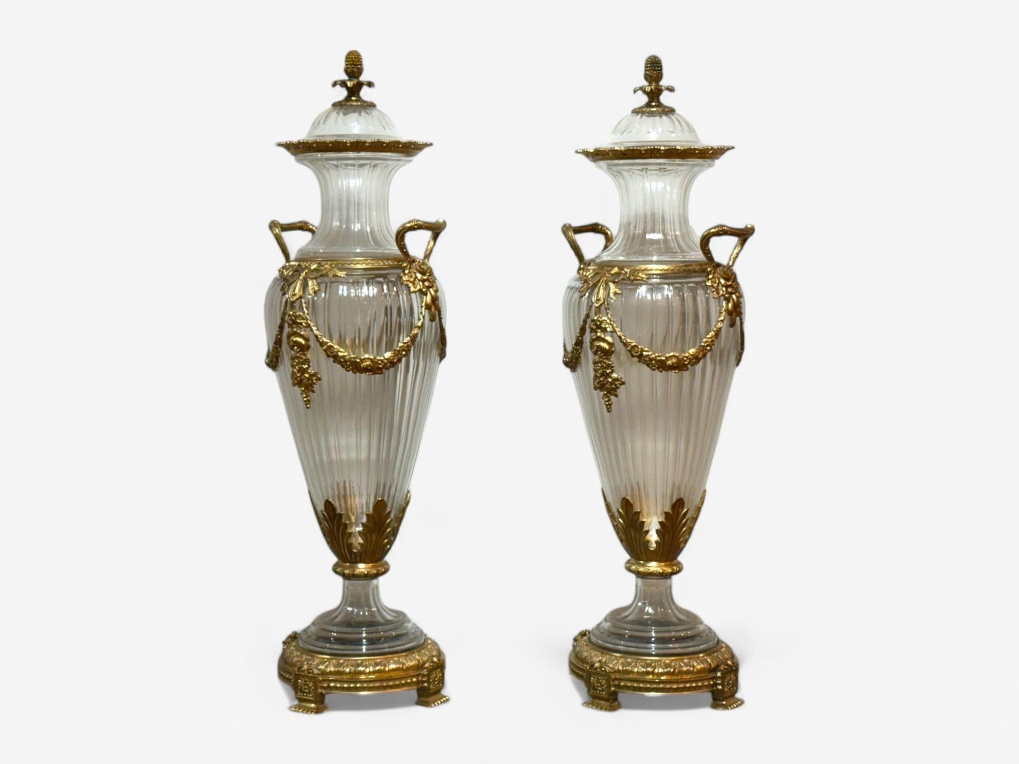 Louis XVI Style, Crystal, Bronze, Monumental Lidded Table-Top Urns or Vases, Italy, 20th c.

Pair of monumental urns or vases in the manner of Baccarat, produced in 20th century Italy. Each example having etched glass crystal forms, removable lids,