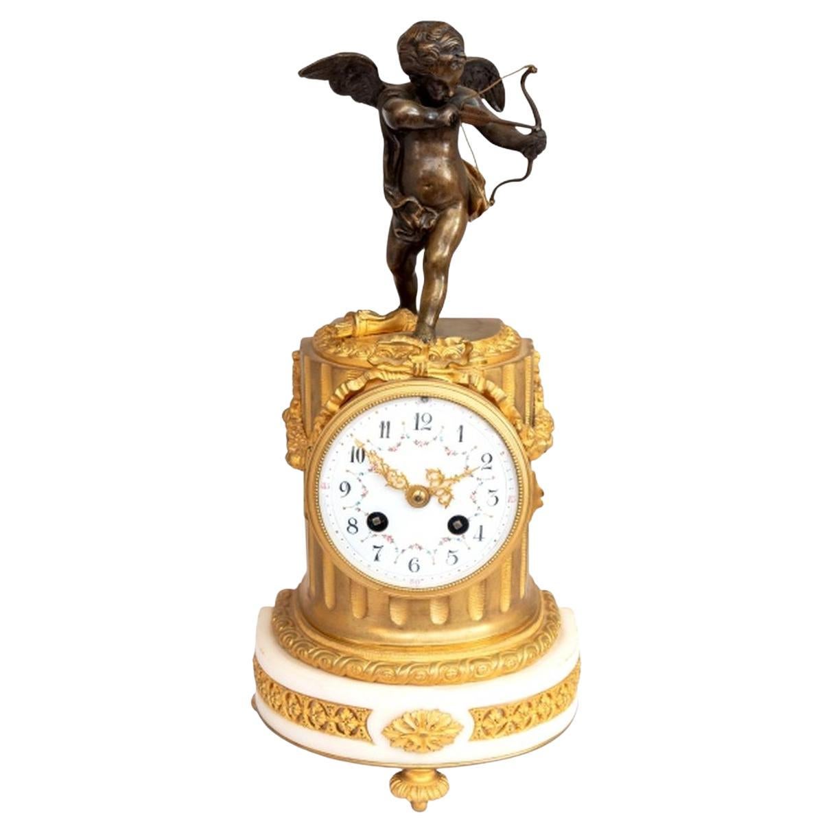 Horloge Cupidon en bronze patiné de style Louis XVI en vente