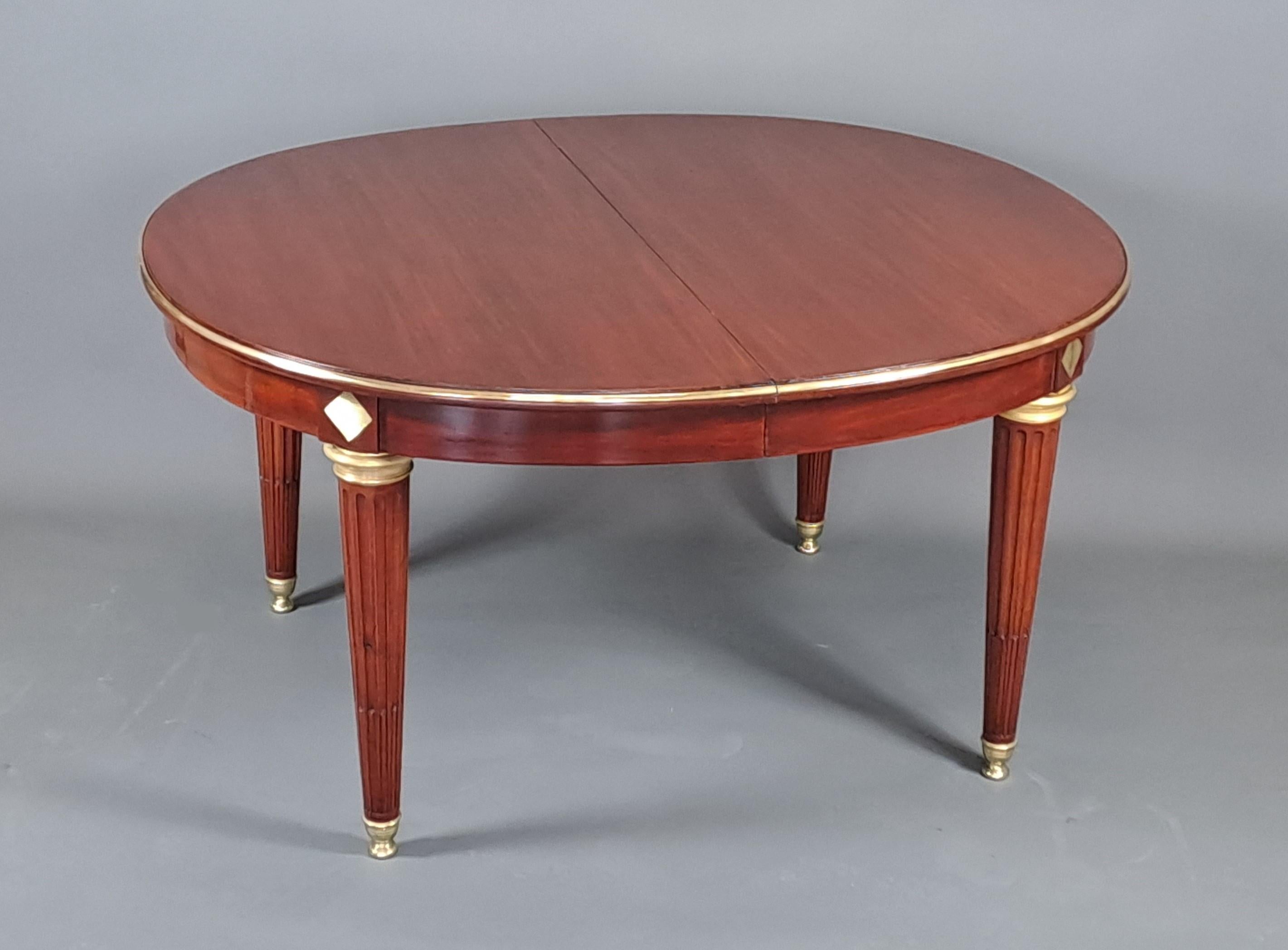 French Louis XVI Style Dining Room Table In Mahogany And Gilt Bronze For Sale