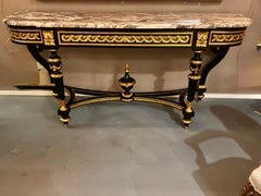 Louis XVI Style ebonized 19 th century console table with gilt bronze mounts