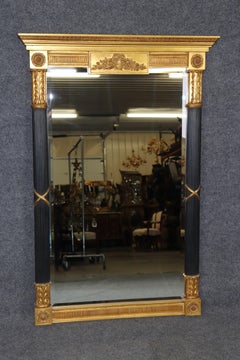 Miroir biseauté sculpté, ébonisé et doré de style Louis XVI par Carver's Guild