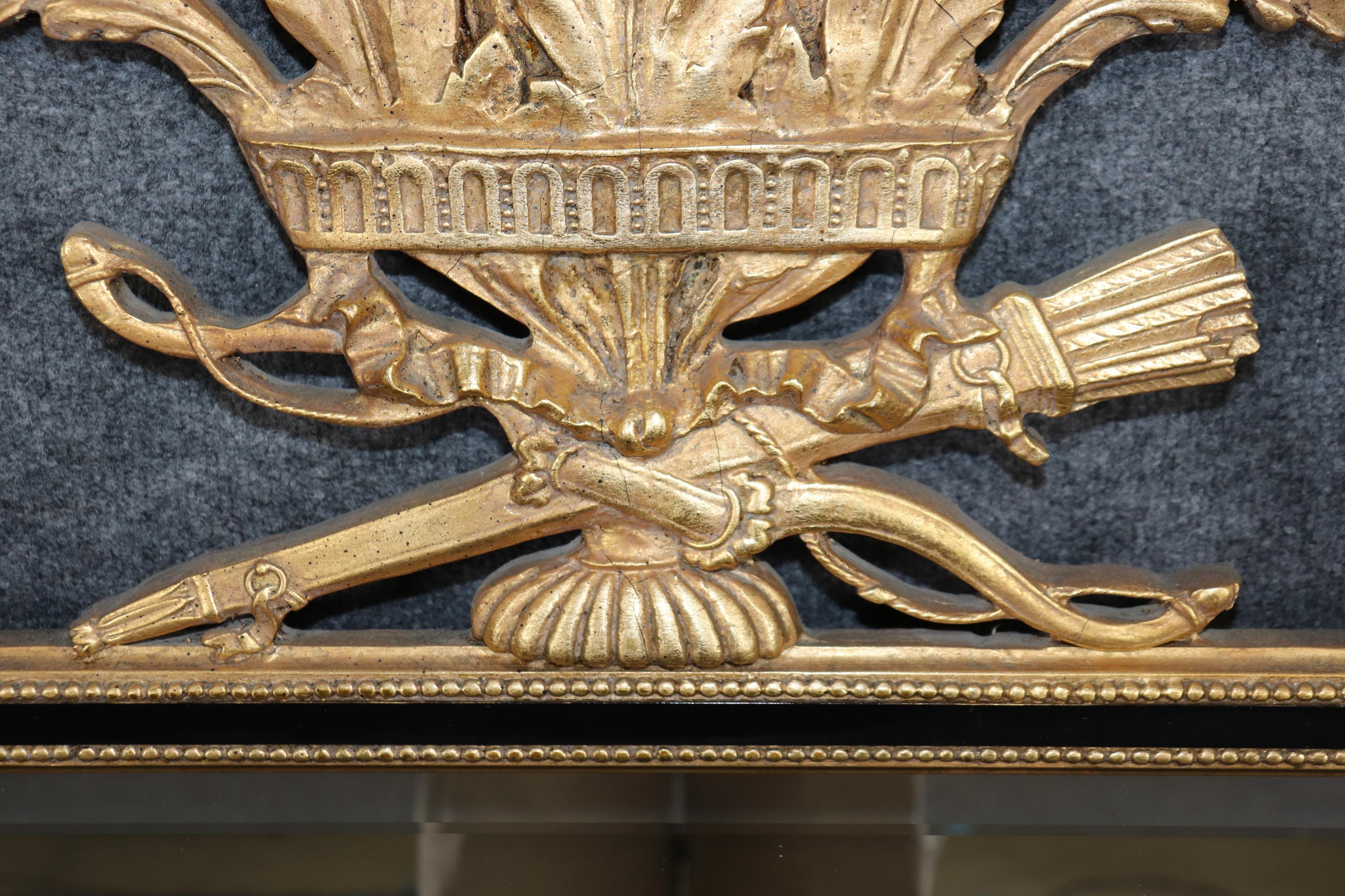20th Century Louis XVI Style Ebonized Gold Gilt Carved Trumeau Mirror By Friedman Brothers