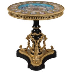 Gueridón ebonizado estilo Luis XVI con placas estilo Sèvres, hacia 1870