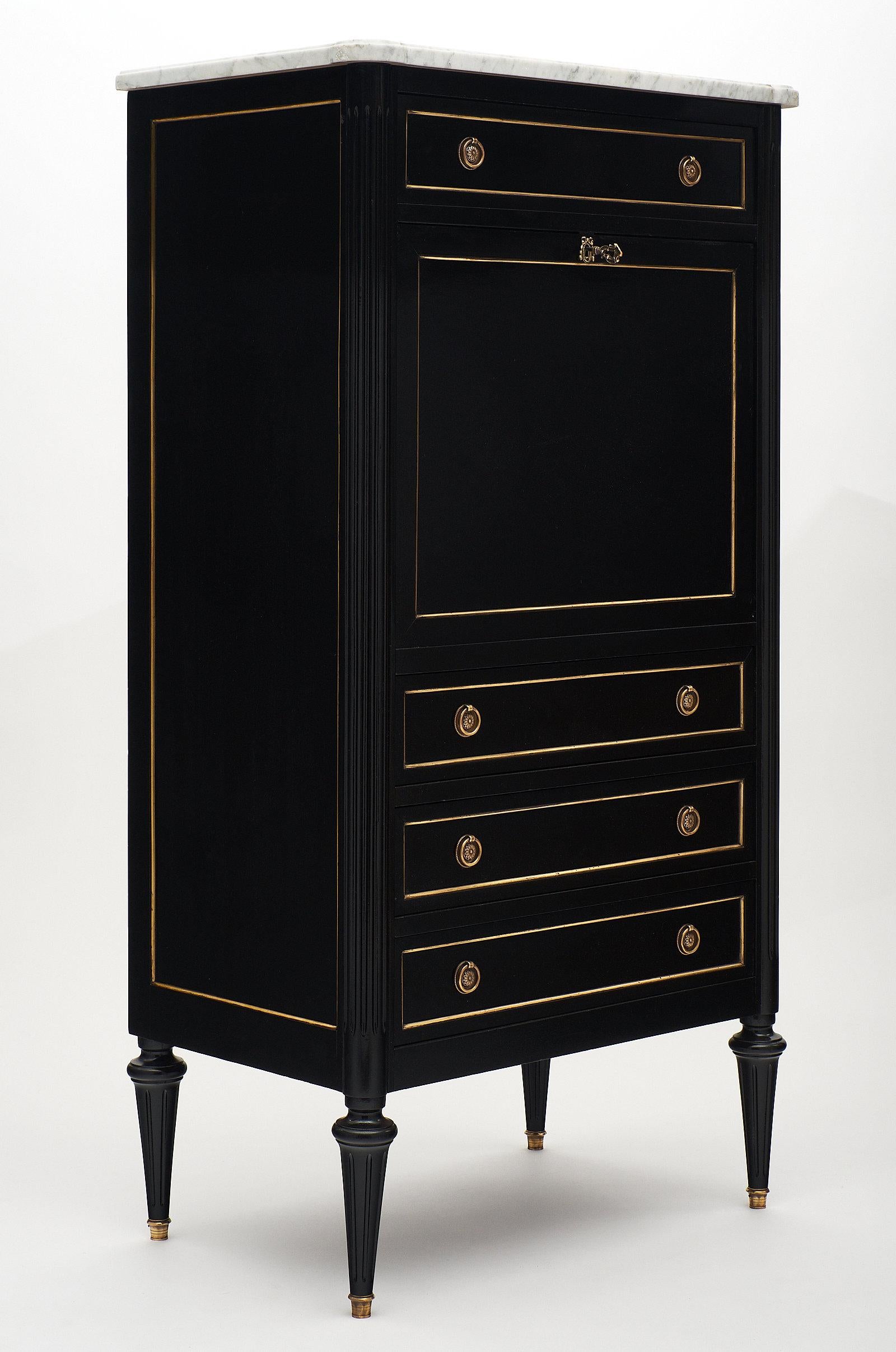 Ebonized Louis XVI style secrétaire - A very well proportioned “secretaire a abattant” made of solid mahogany and finished in a lustrous ebonized tone. This piece is topped with a pristine Carrara marble. The high quality is also visible in the