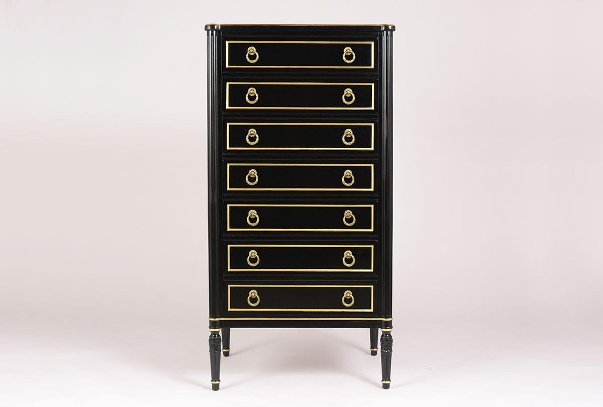 This French Mahogany Loius XVI Style Semainier has been completely restored, features a new ebonized finish with gilt details. This Semainier comes with seven drawers, each has two brass handles with molding details, carved columns running down the