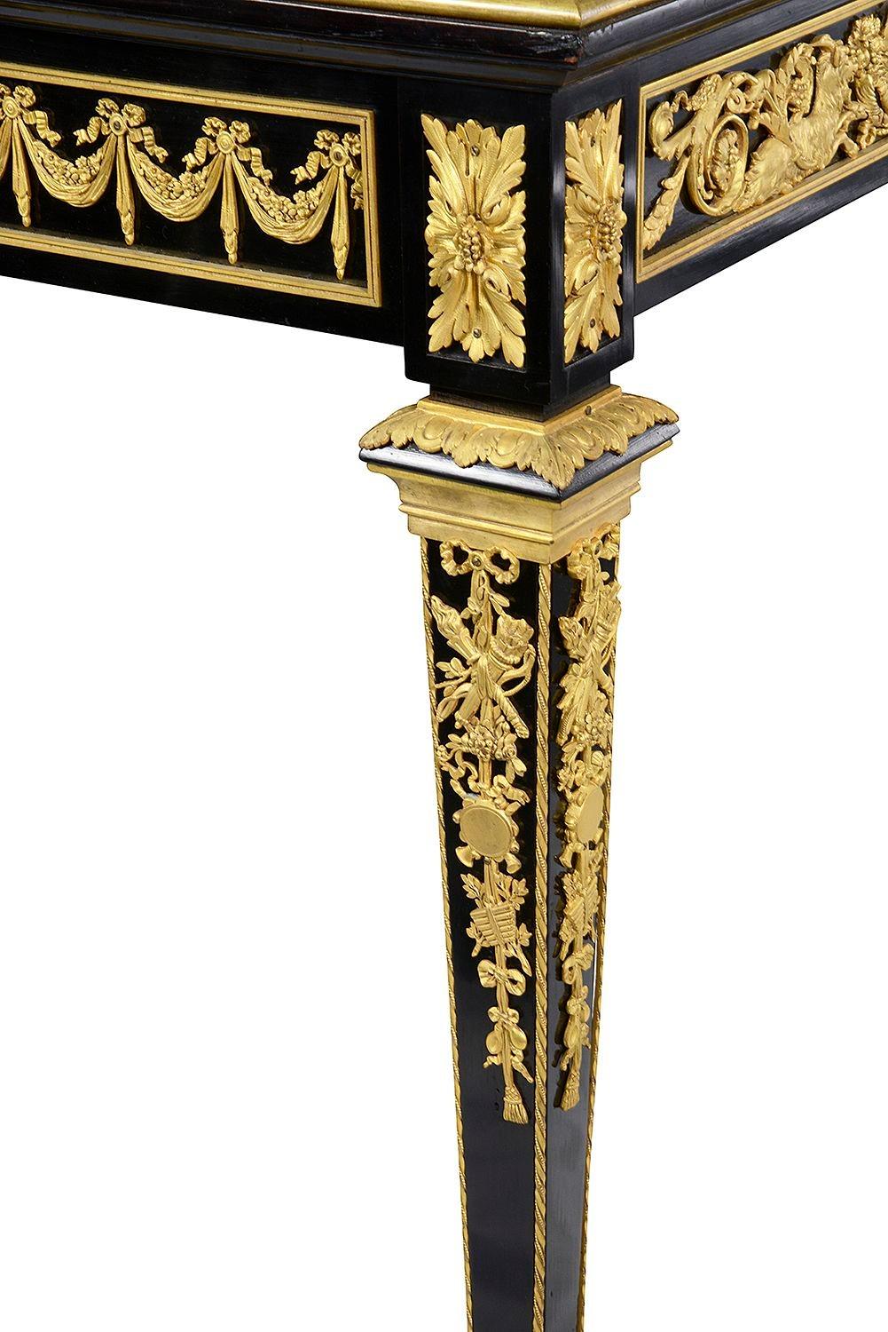 Ormolu Louis XVI style Ebony centre table, attributed to Paul Sormani For Sale