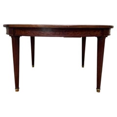 Louis XVI style extendable oval table – Speckled mahogany – 19th century