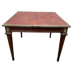 Louis XVI style extendable table – Leather top gilded with small iron – Gilt bro