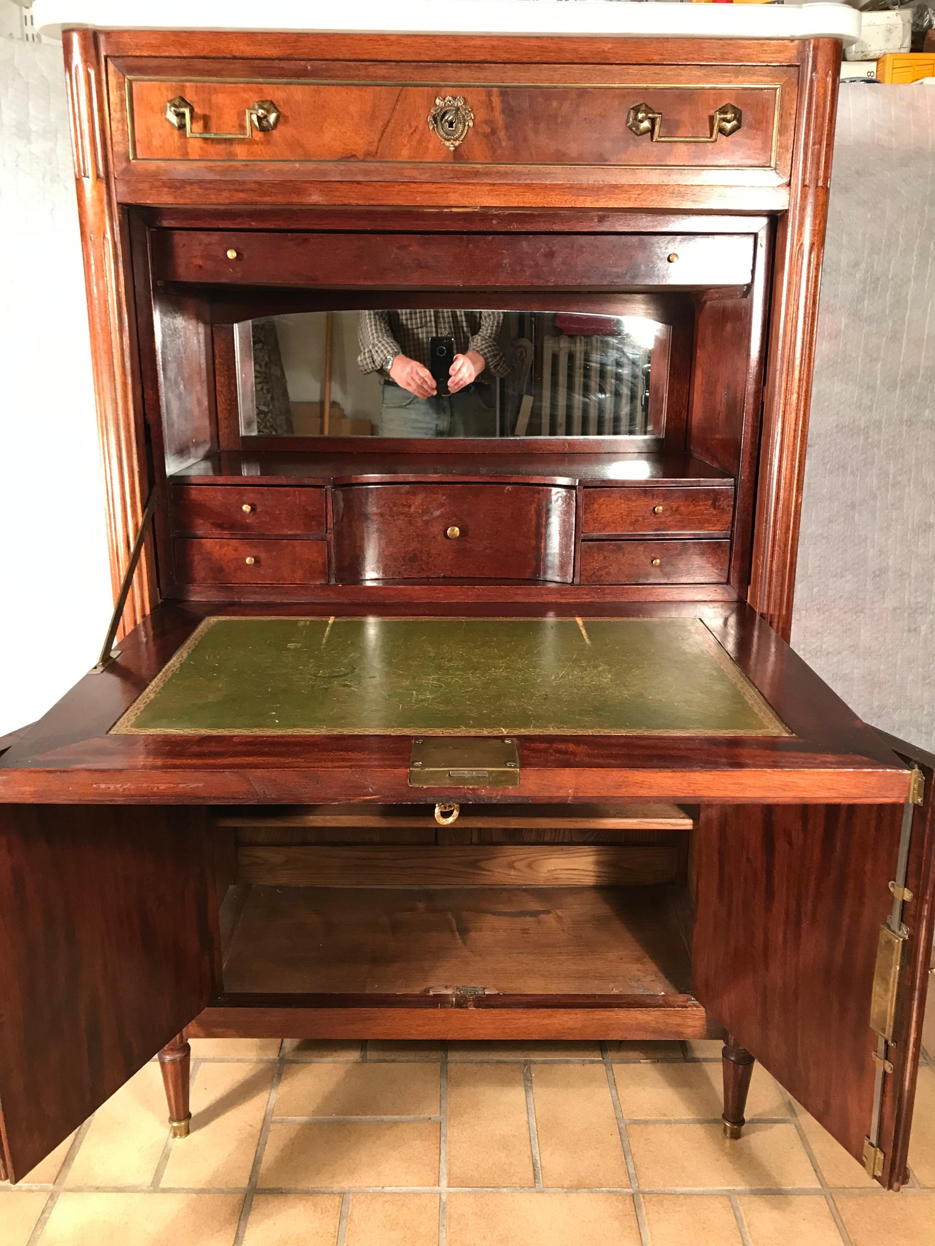 Louis XVI style fall top secretaire, France second half of the 19th century, mahogany veneer with white marble top. In very good condition. The secretaire will be shipped from Germany, shipping costs to Boston are included.