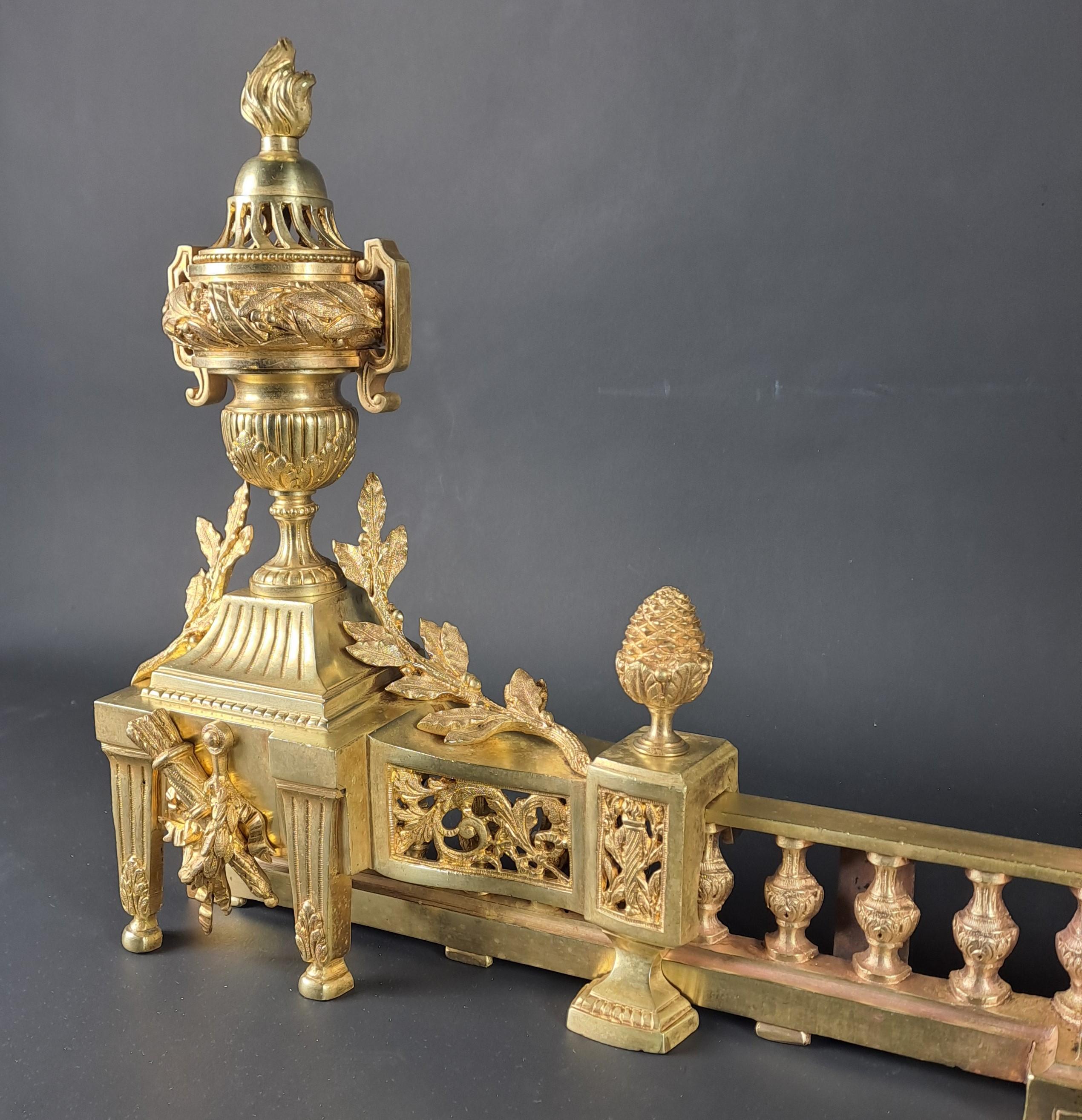 French Louis XVI Style Firebar / Andirons In Gilded Bronze For Sale