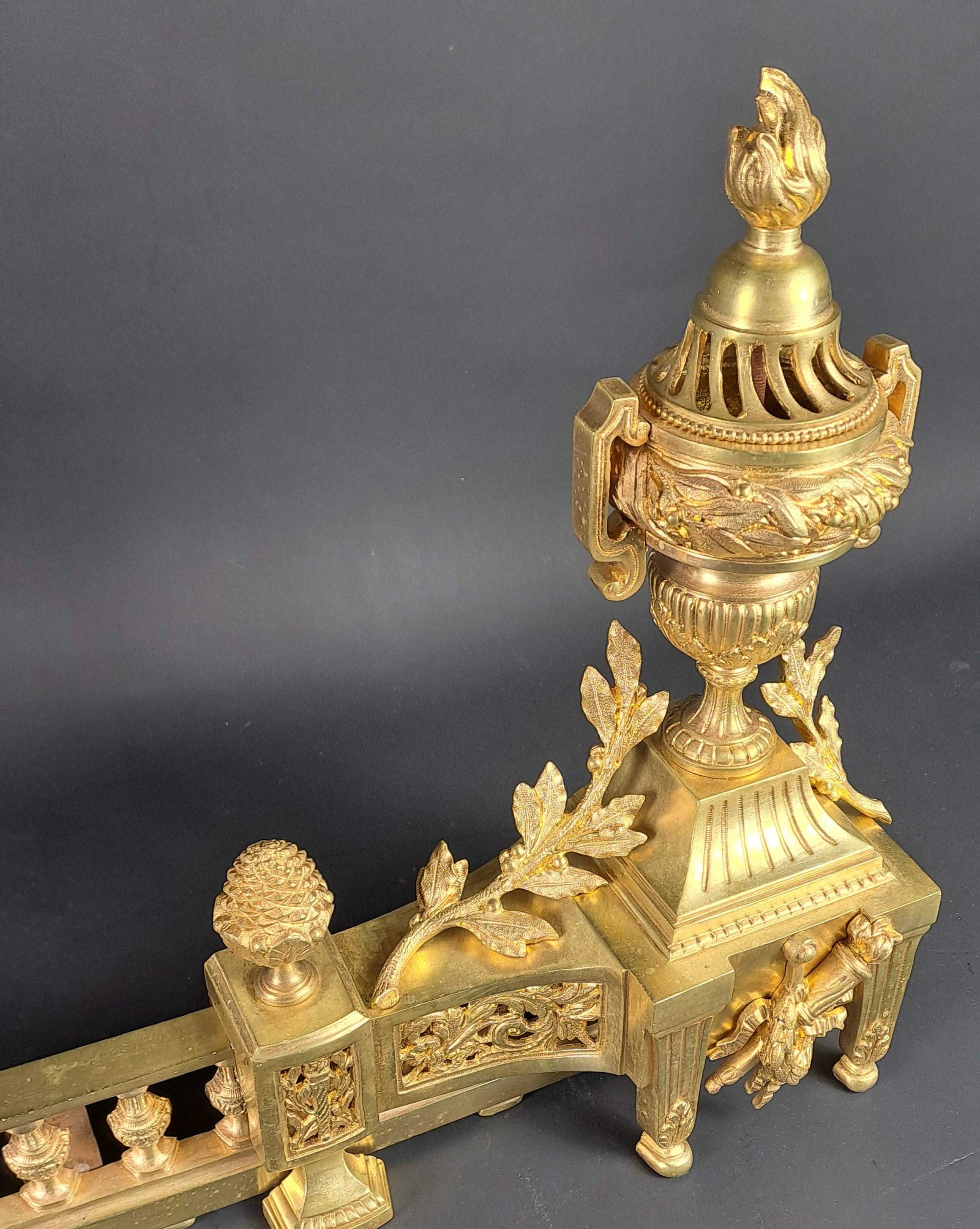 Gilt Louis XVI Style Firebar / Andirons In Gilded Bronze For Sale