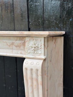 Louis XVI style fireplace in pink marble, circa 1920