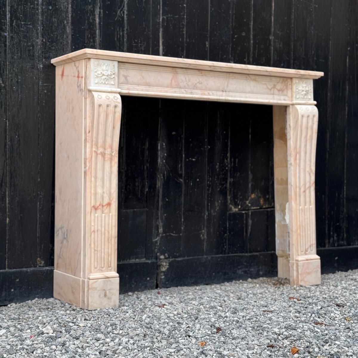 19th Century Louis XVI style fireplace in pink marble, circa 1920 For Sale