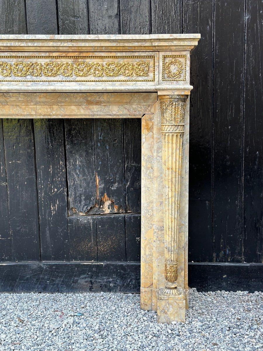 19th Century Louis XVI Style Fireplace in Yellow Siena Marble and Gilt Bronzes For Sale