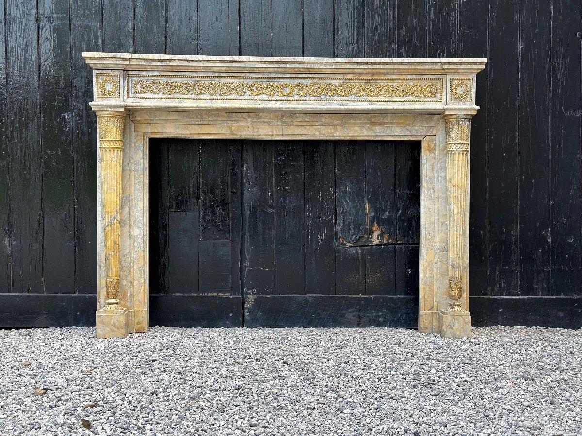 Louis XVI Style Fireplace in Yellow Siena Marble and Gilt Bronzes For Sale 1