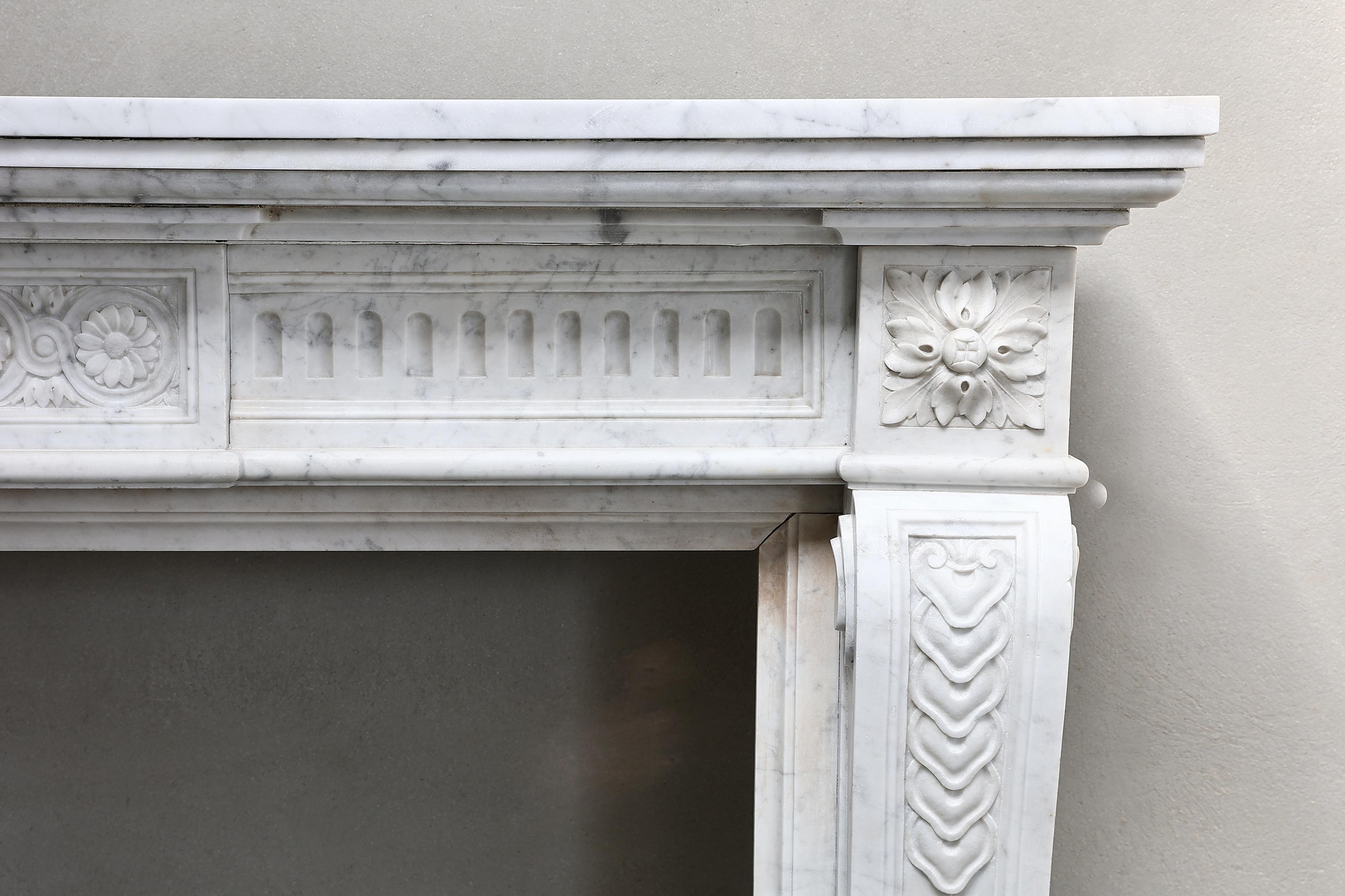 French Louis XVI Style Fireplace of Carrara Marble from the 19th Century