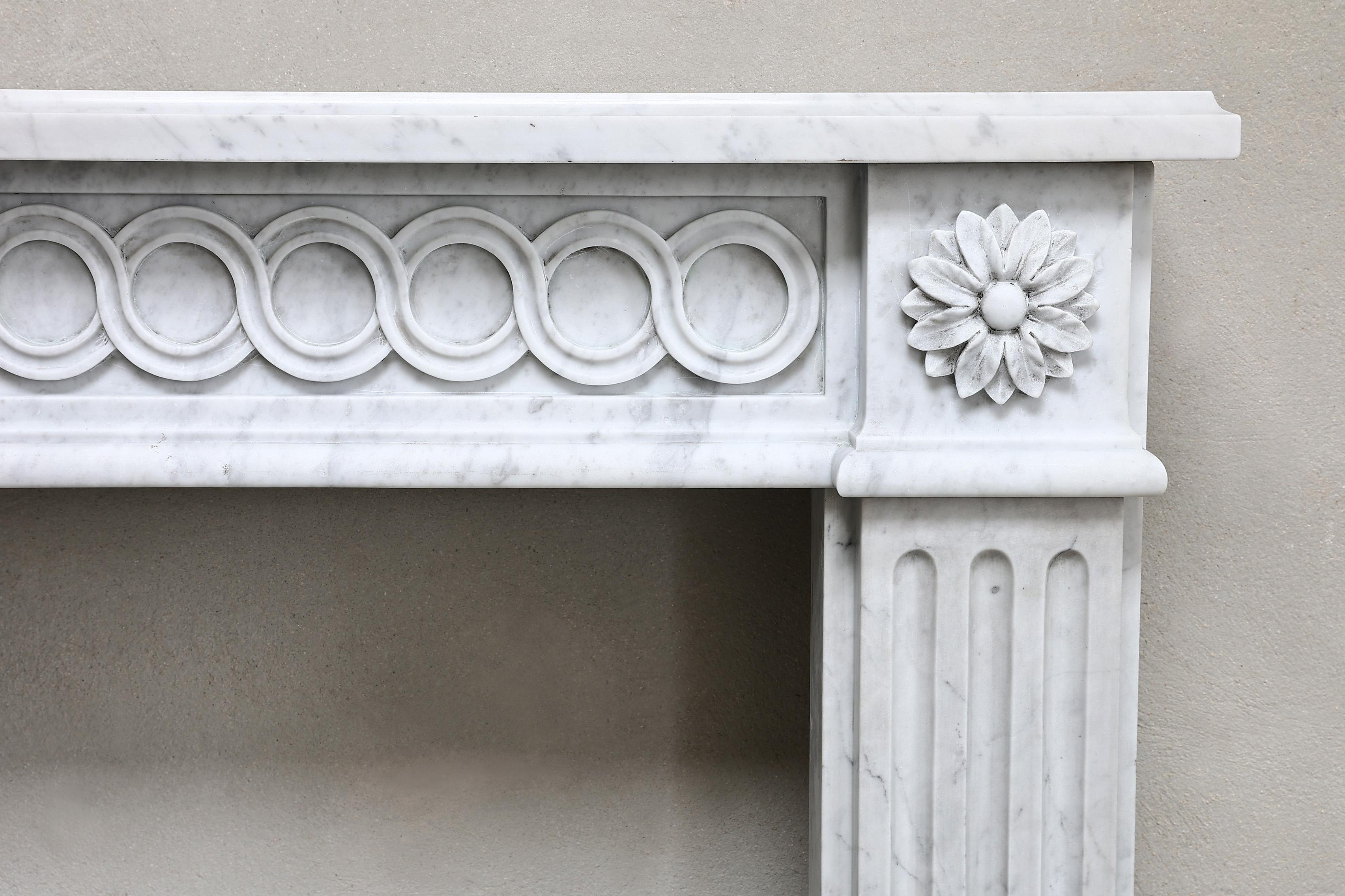 French Louis XVI Style Fireplace of Carrara Marble from the 19th Century
