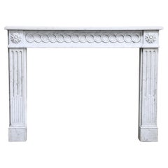 Louis XVI Style Fireplace of Carrara Marble from the 19th Century